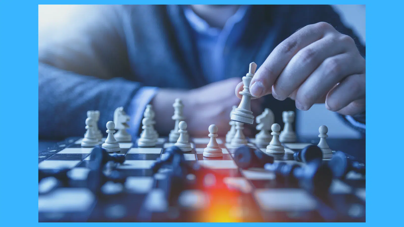 A chess board is shown with the player playing white holding the king piece.