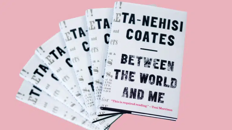 Multiple copies of the book 'Between the World and Me' are shown