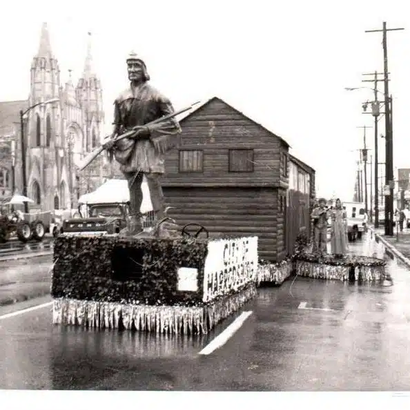 Harrodsburg bicentennial parade float depicting a pioneer in front of the fort, 1974